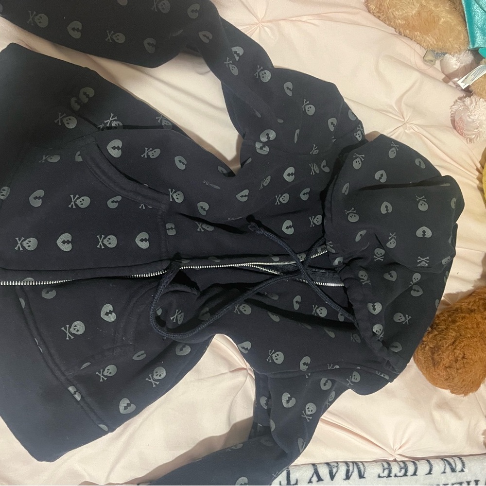 Black Jacket with Skull and Heart Pattern